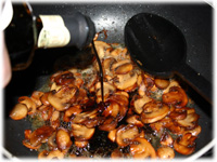 adding balsamic vinegar to fried mushrooms