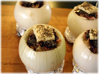 stuffed onion with bbq sauce butter and pepper