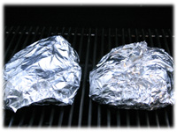 foil wrapped squash on the grill
