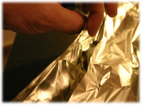 wrapping a baking potato in foil 