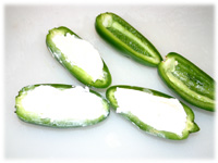 fill jalapeno with cream cheese