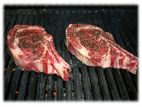 rib steaks on the grill position 1