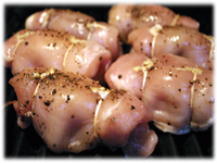 stuffed chicken breasts on the grill