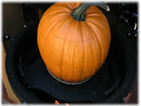 cooking stuffing in a pumpkin on bbq