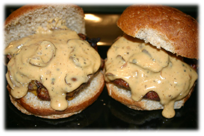 cheeseburgers smothered in cheese sauce
