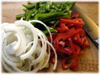 sliced peppers onions
