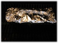 potatoes on the grill in foil packs