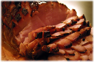 carving a smoked ham